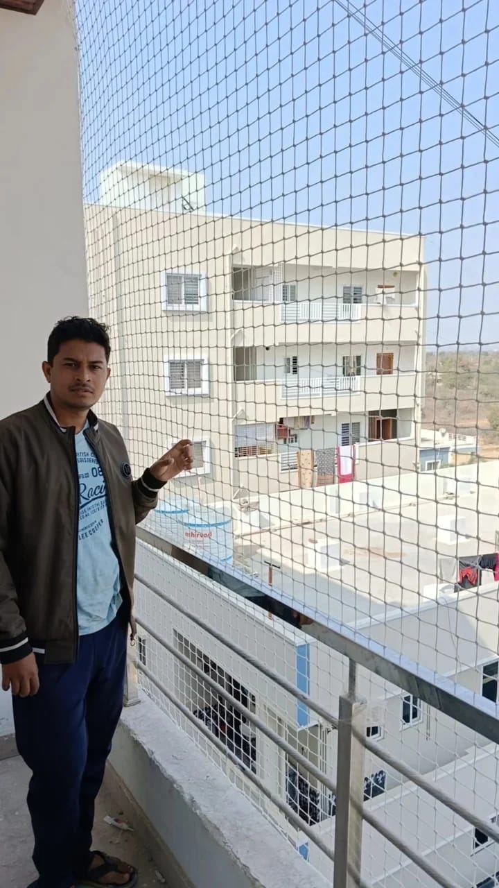 Transparent balcony safety nets for residential and commercial buildings. Stylish protection for every space.