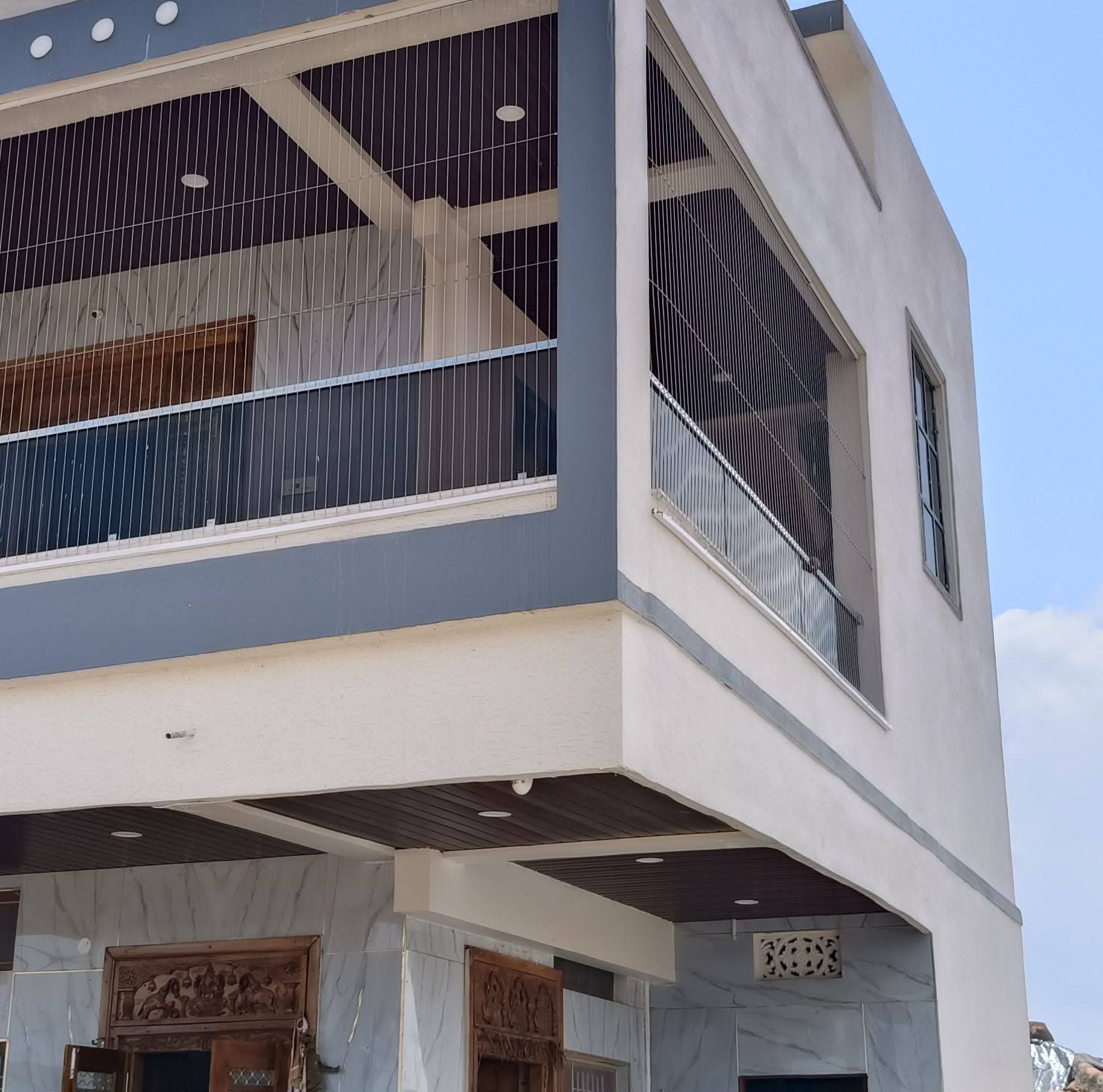 Balcony invisible grills ideal for offices, hotels, and commercial buildings. Strong, durable, and stylish.