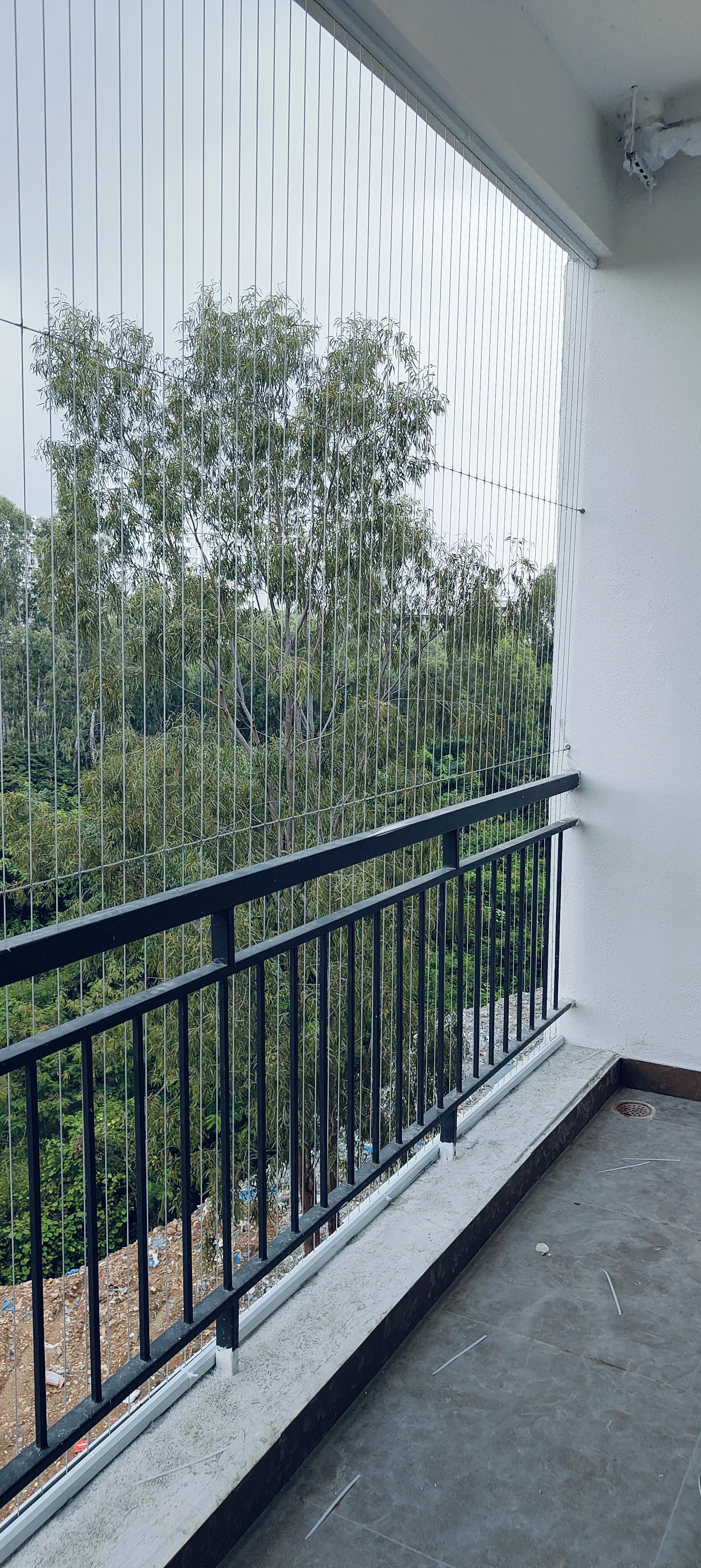 Balcony invisible grills for high-rise living. Strong cables with elegant appearance.